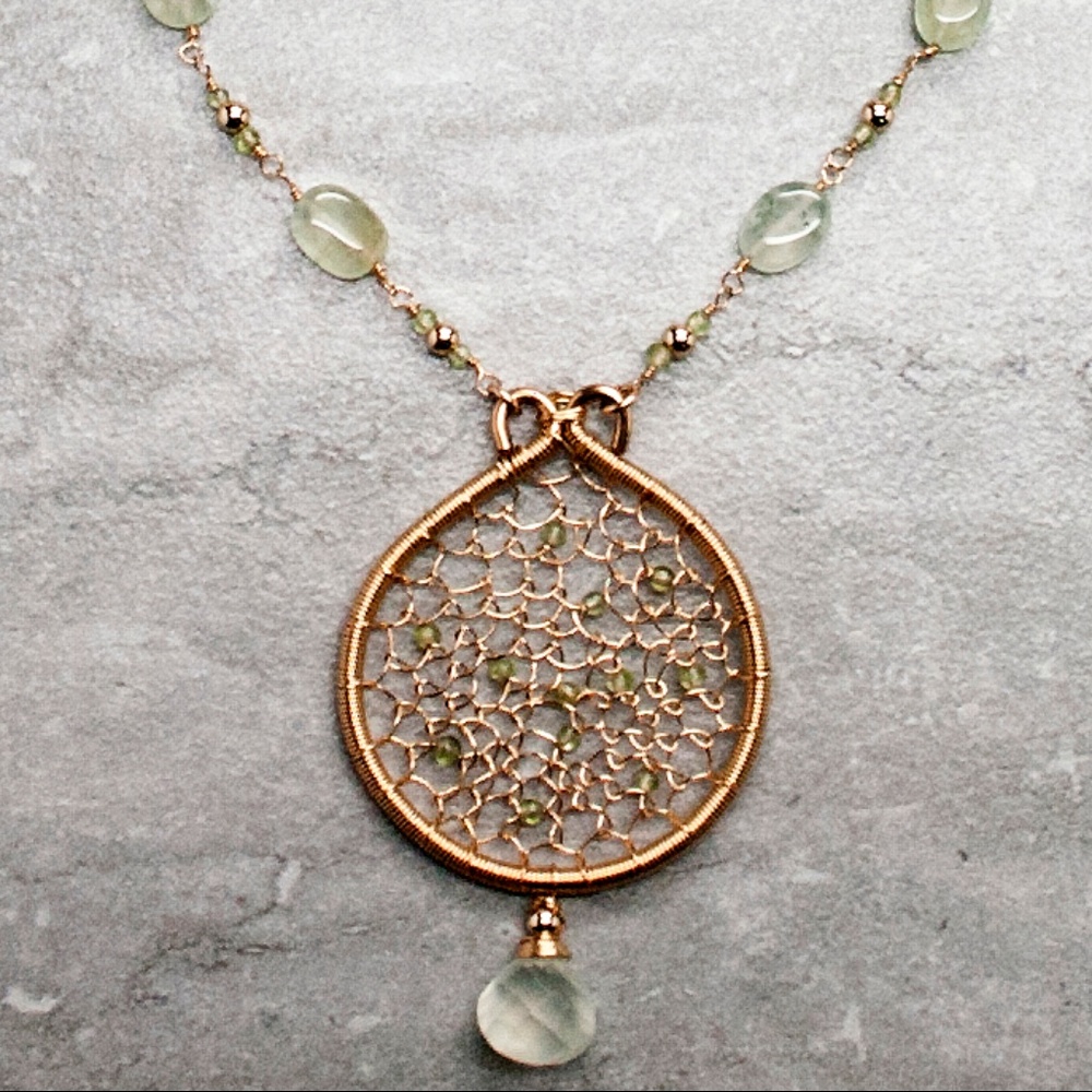 Pale green and gold woven long pendant necklace